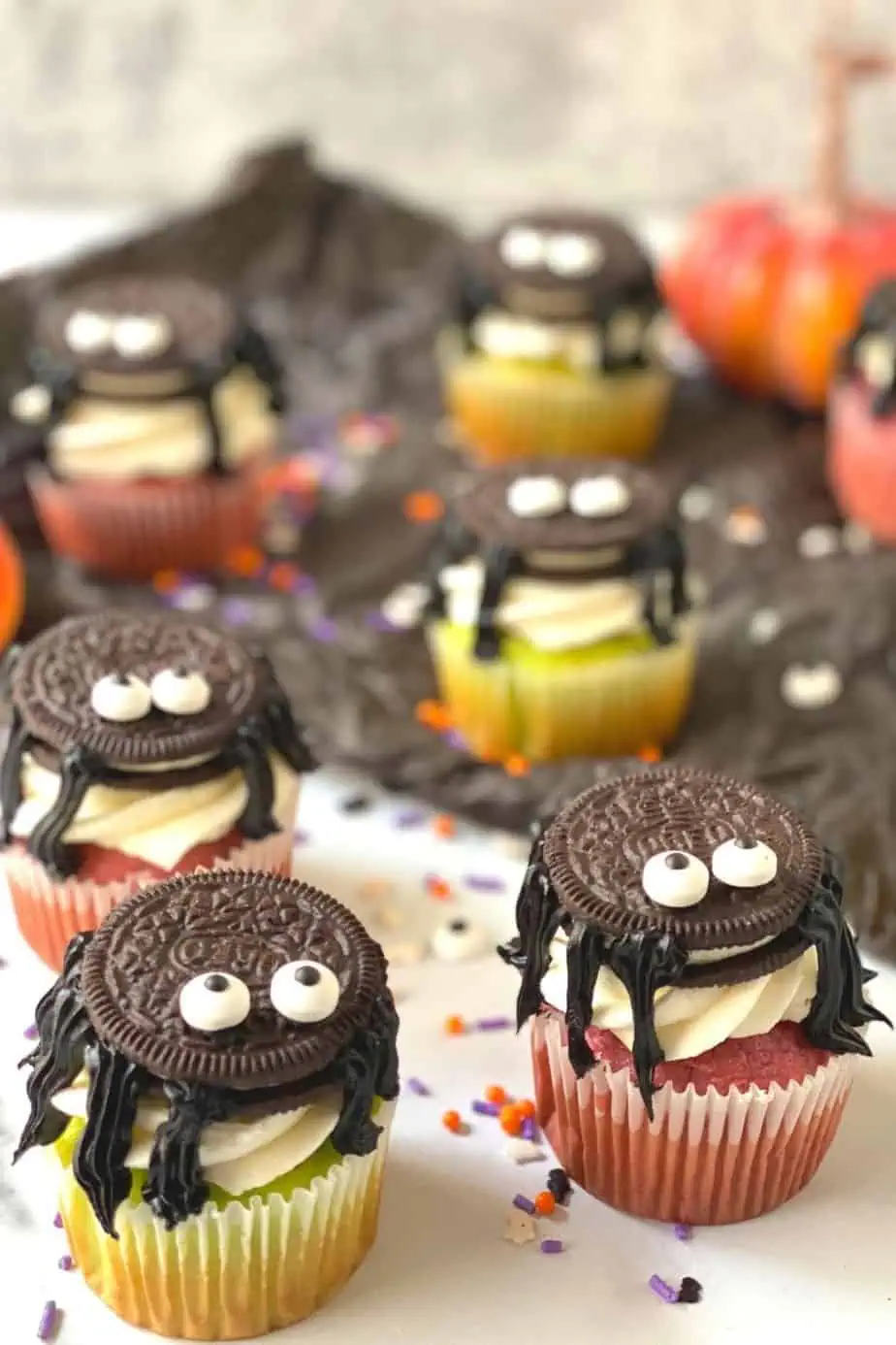 Oreo Spider Cupcakes for Halloween are a tasty treat that kids will love eating and making. The colorful and cute cupcakes are sure to be a huge hit at Halloween gatherings, birthday parties and fall activities with family and friends. The best part yet, this Halloween-inspired cupcake recipe is topped with an Oreo cookie spider.