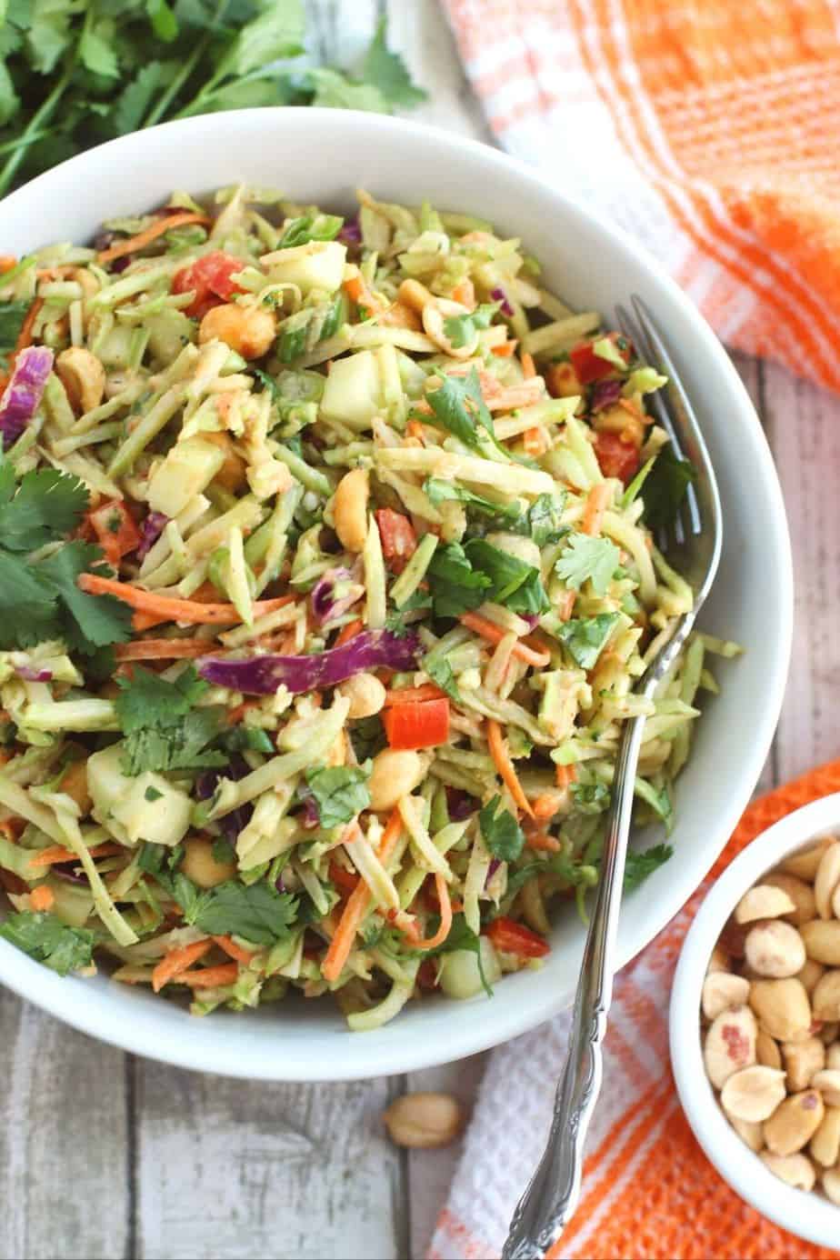 Enjoy the fresh taste of this flavorful yet healthy Low Carb Thai Peanut Salad. Packed with Asian flavors, it has a unique taste that is undeniably good, making it perfect for lunch, or dinner, whichever you prefer. This Thai recipe has everything - creamy Thai peanut sauce, crunchy broccoli slaw and peanuts. Even if you’re not following a low-carb diet, this is still a fantastic salad to make and enjoy.