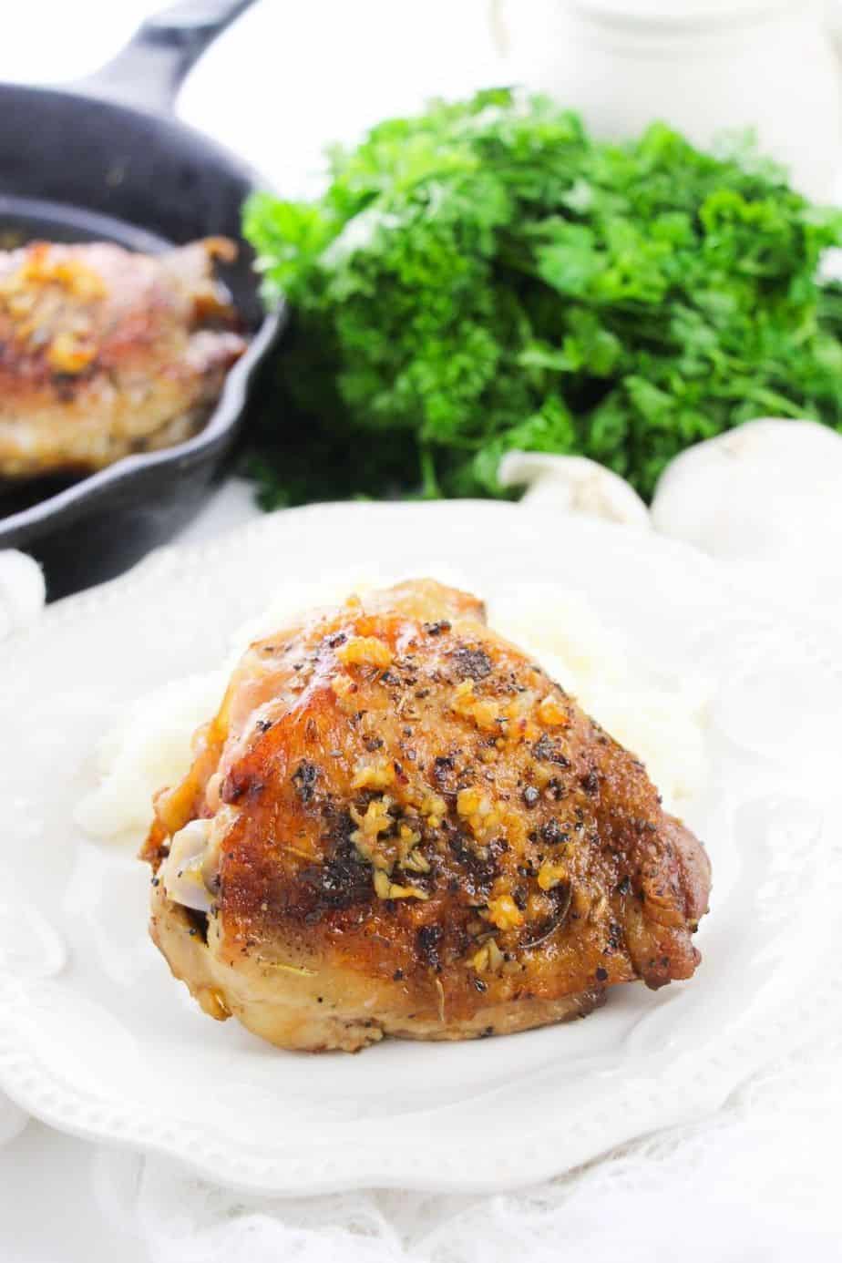 Make a delicious main dish entree with this recipe for Garlic Chicken Thighs. They’re juicy, tender, and full of flavor, making them the perfect meat to serve with your favorite side dishes. This easy chicken recipe is an easy weeknight meal idea.