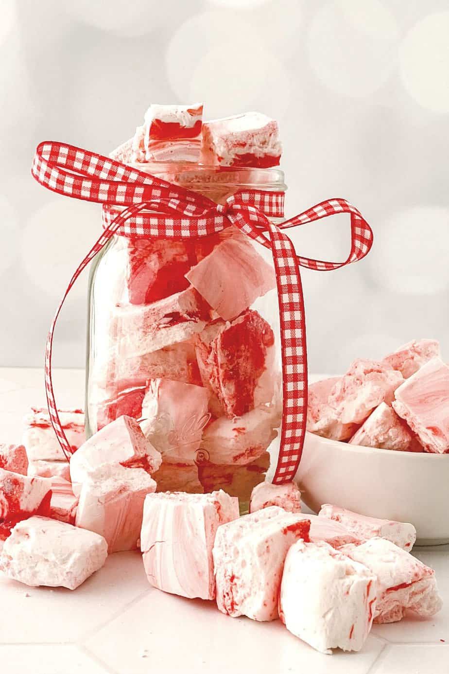 These Peppermint Marshmallows are simple to make and delicious to consume. Holiday treats are so easy to do thanks to this recipe. This homemade marshmallow recipes is a perfect DIY gift idea for the holidays. Wrap them up with a mug and a packet of hot chocolate for an easy food gift idea.