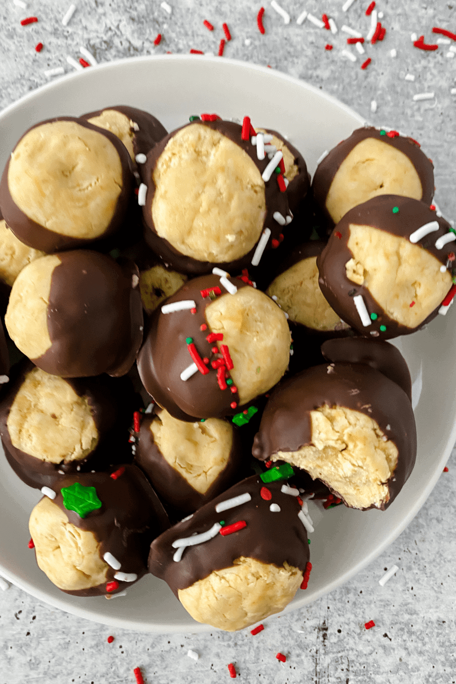 Want a delicious no bake candy for the holidays? These Buckeyes are so tasty and easy to make, you just need a few ingredients. This Best Buckeye Recipe is a sure way to please a crowd. They are the perfect holiday treat.