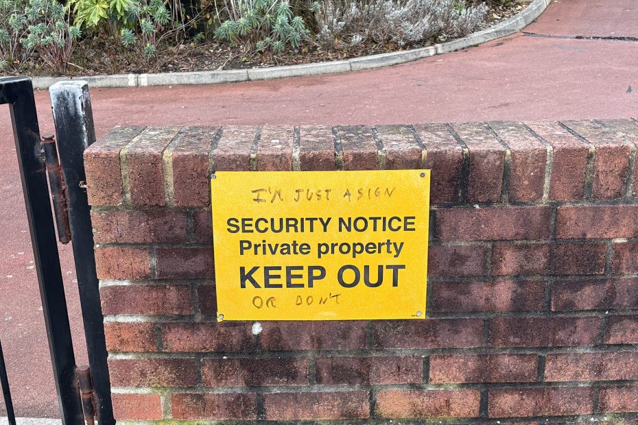 Keep out sign with graffiti