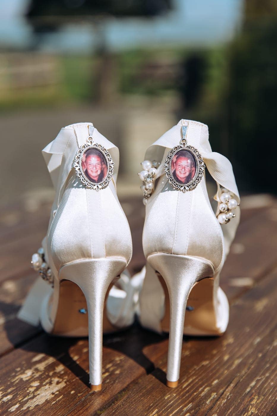 an outdoor ceremony with the bride walking down the aisle to get married at heaton house farm