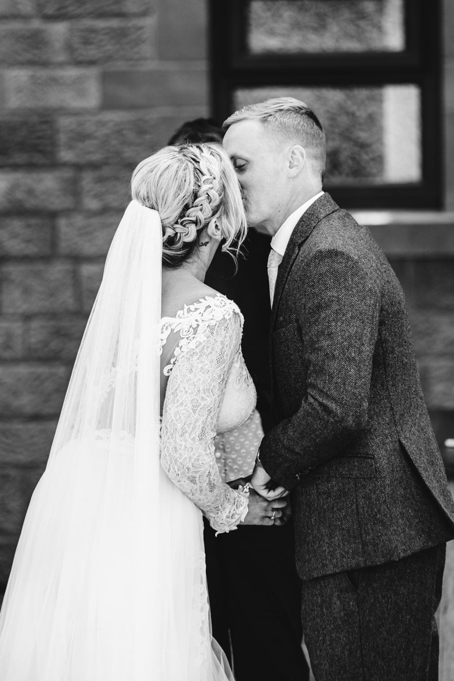 an outdoor ceremony with the bride walking down the aisle to get married at heaton house farm
