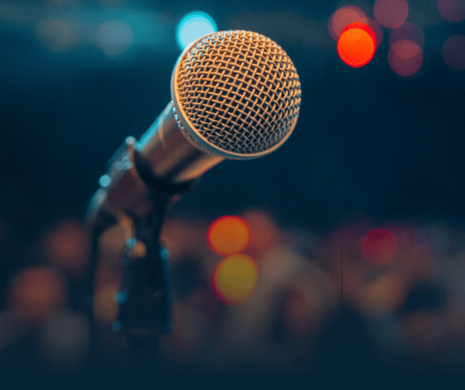 PR for bars and nightlife: microphone and warm stage lights in a UK live music bar