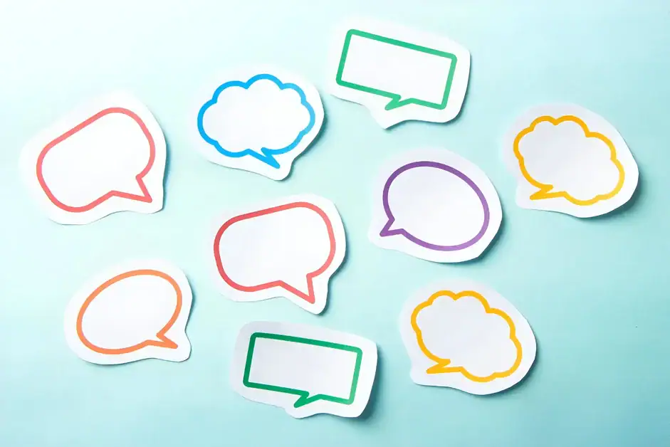 A diverse group of people engaged in a lively discussion, illustrating effective communication