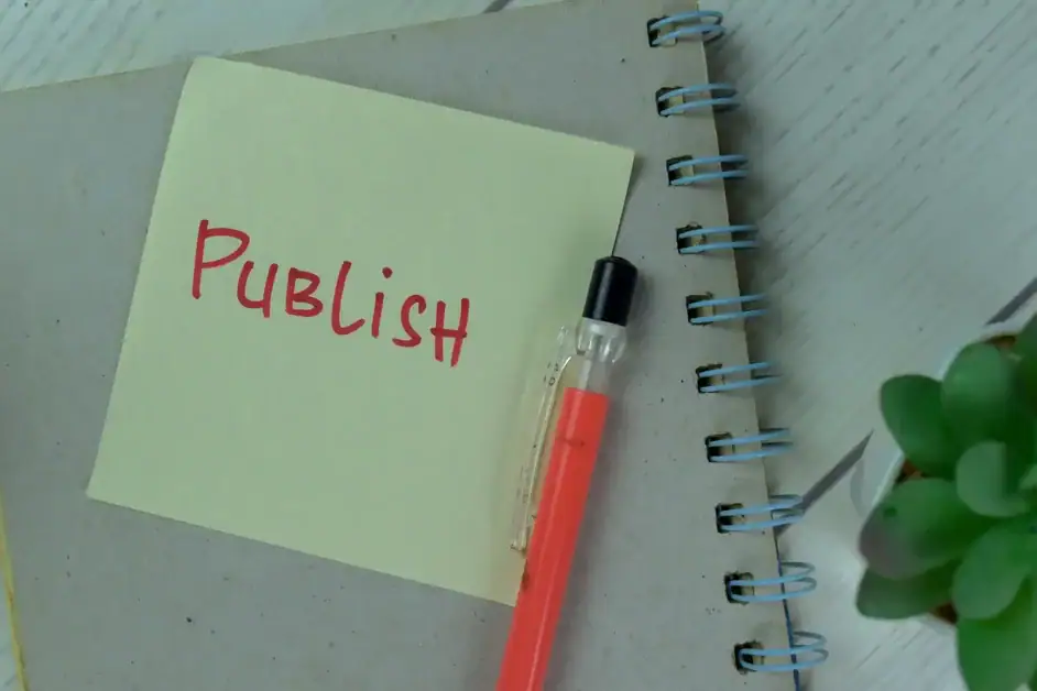 A blogger seated at his workdesk