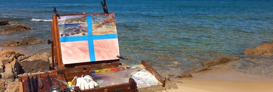 Painting on the Sardinian coast during a plein air session with a portable pochade box overlooking the Mediterranean Sea.