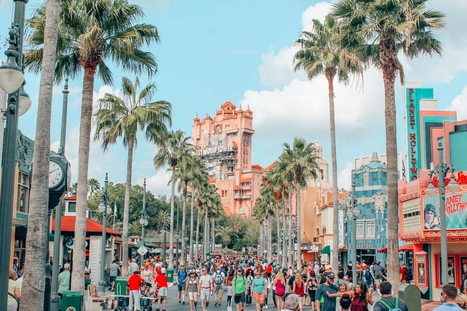 What to pack for Disney World and Disneyland: the ultimate Disney packing list for adults, created by a former Cast Member. Disney packing tips including what NOT to pack, snacks, essential gear, and what to bring to maximize Disney fun while staying on a budget!