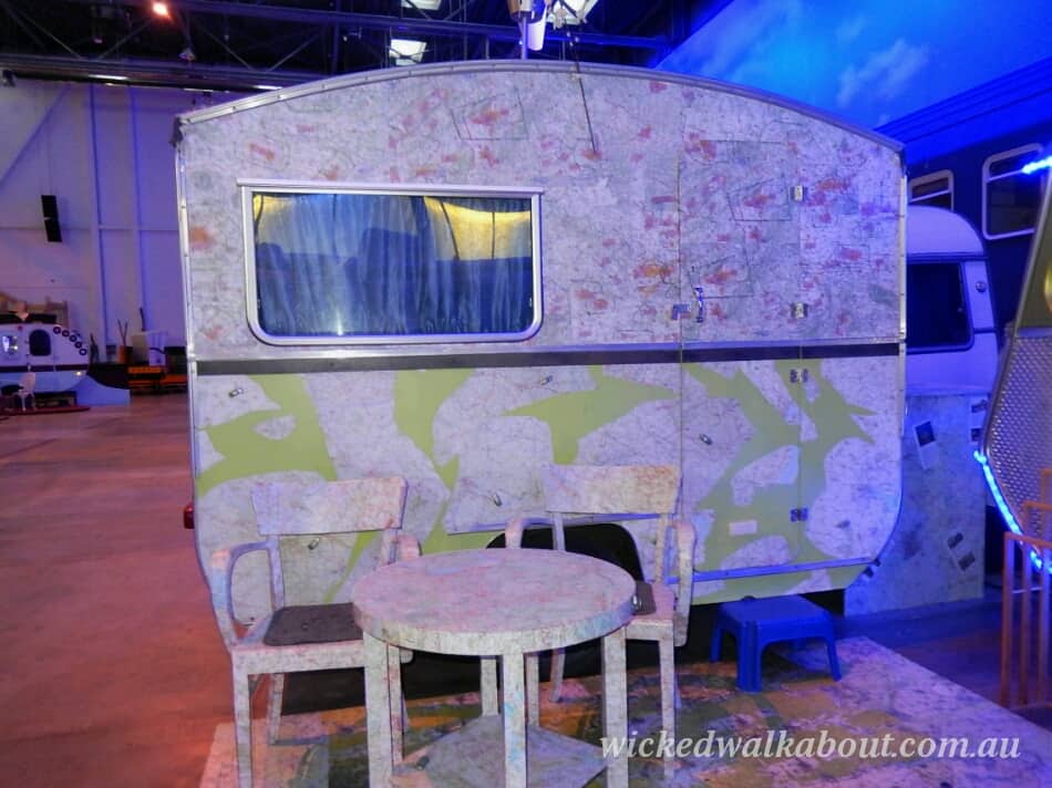 Base Camp Hostel, Europe. A unique little caravan to sleep in with maps covering the outside.