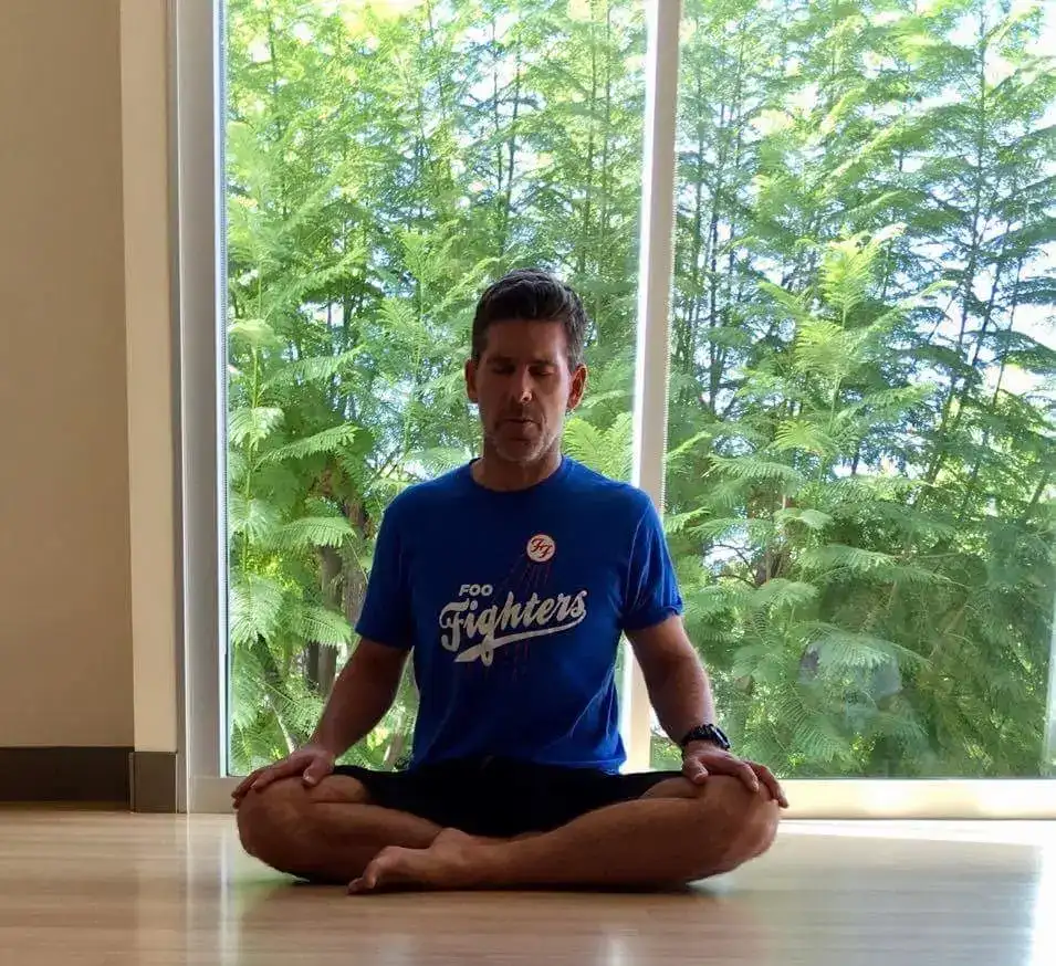 man doing a yoga meditation