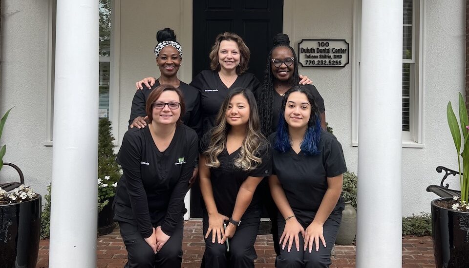 Duluth Dental Center team in front of the office