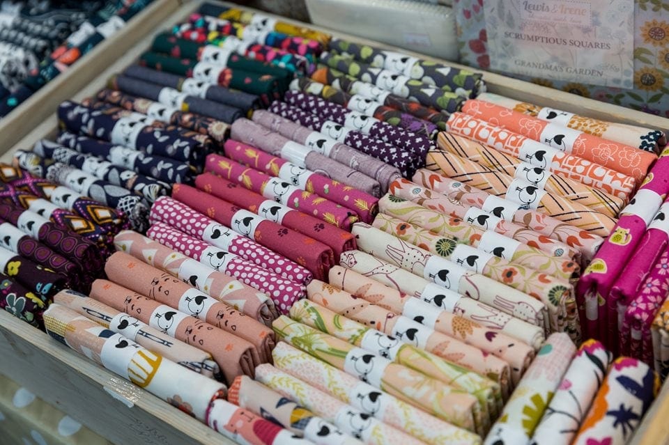 Shopping for fat quarters at the Knitting and Stitching Show Alexandra Palace October