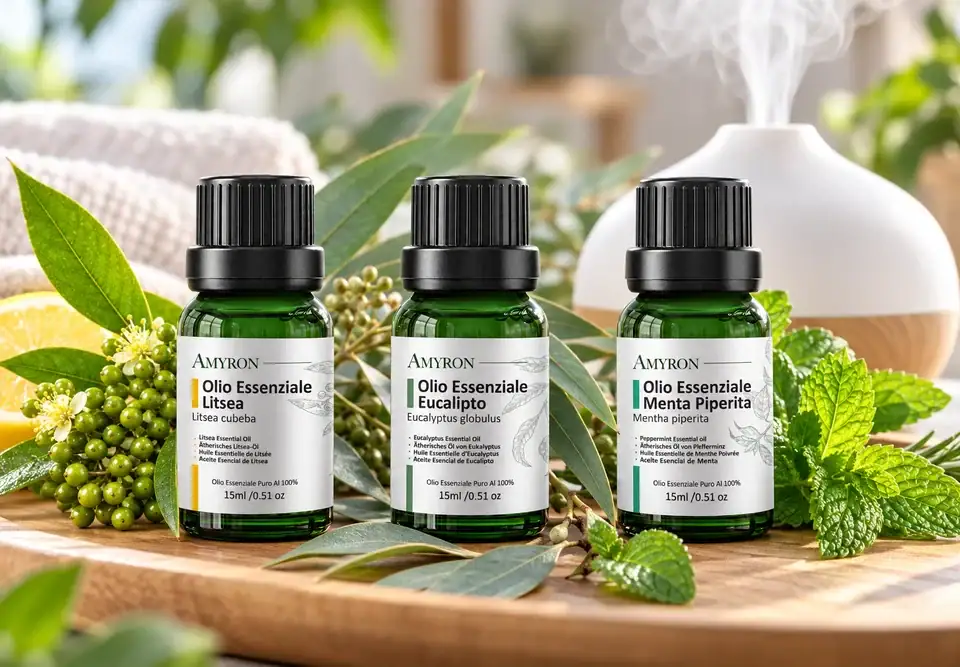 Oli essenziali AMYRON per respirare meglio con eucalipto globulus, menta piperita e litsea accanto a un diffusore