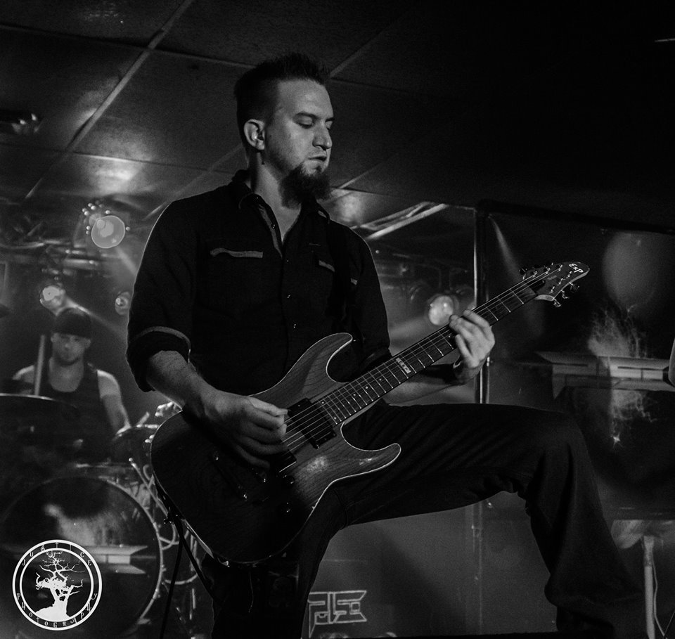 James Brennaman plays Guitar with Jimmy Lay on Drums in background with the Hard Rock Band Pulse in Kansas City at Collapsefest, circa August 2014