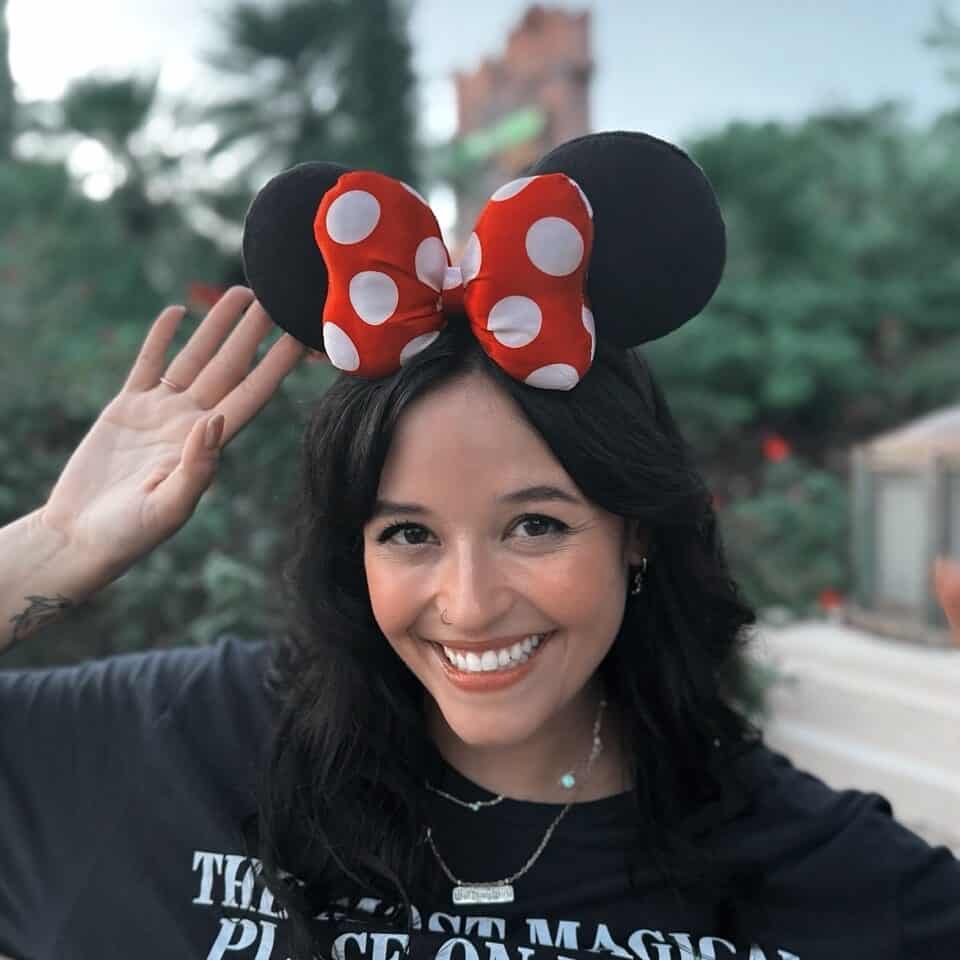 Minnie Mouse headband with polka dot bow for Disney theme parks and vacations.
