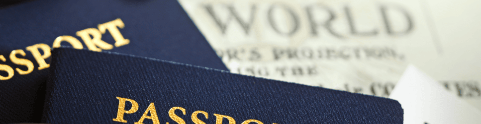 Image of passports and world newspaper