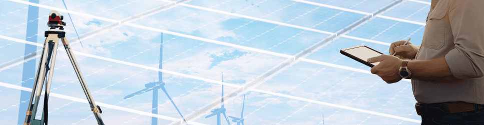 Image of a farmer and land survey equipment with renewable technology in the background for renewable sector page header.
