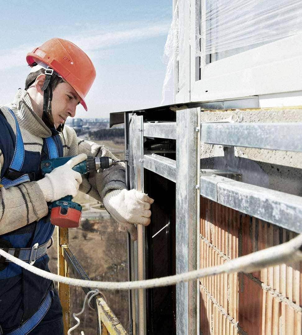 HVAC system installation on a residential building under construction.
