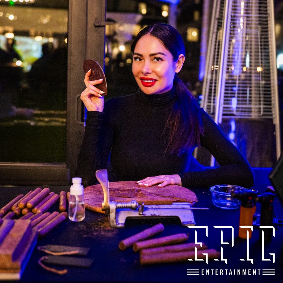 Professional female cigar roller for a luxury Las Vegas event by Cigar Bella