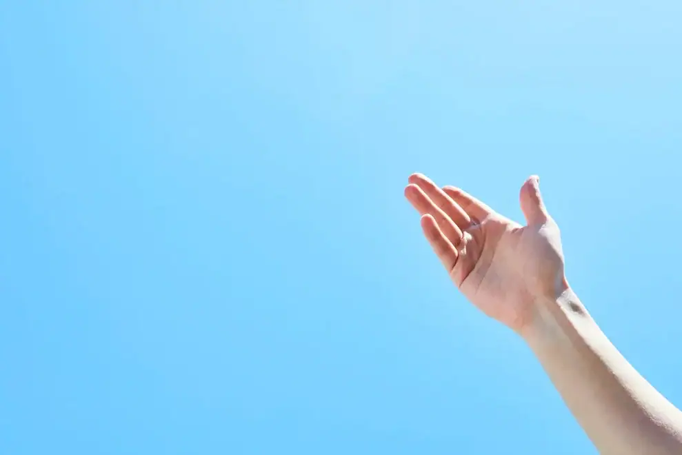 A serene, natural landscape with a calm river winding through lush greenery, symbolizing a peaceful way to reduce stress and anxiety in your life