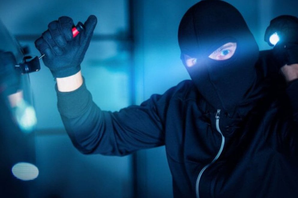 silhouette of person on window