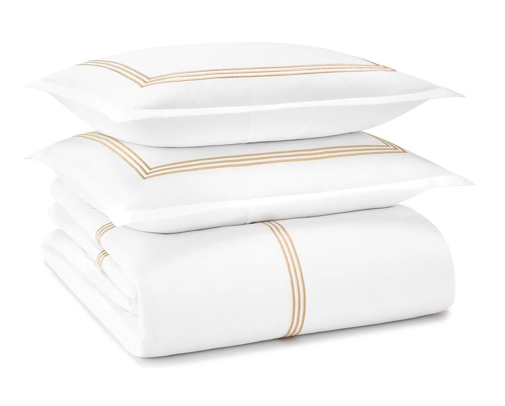 A Standard Textile Sateen duvet cover with Sesame embroidery