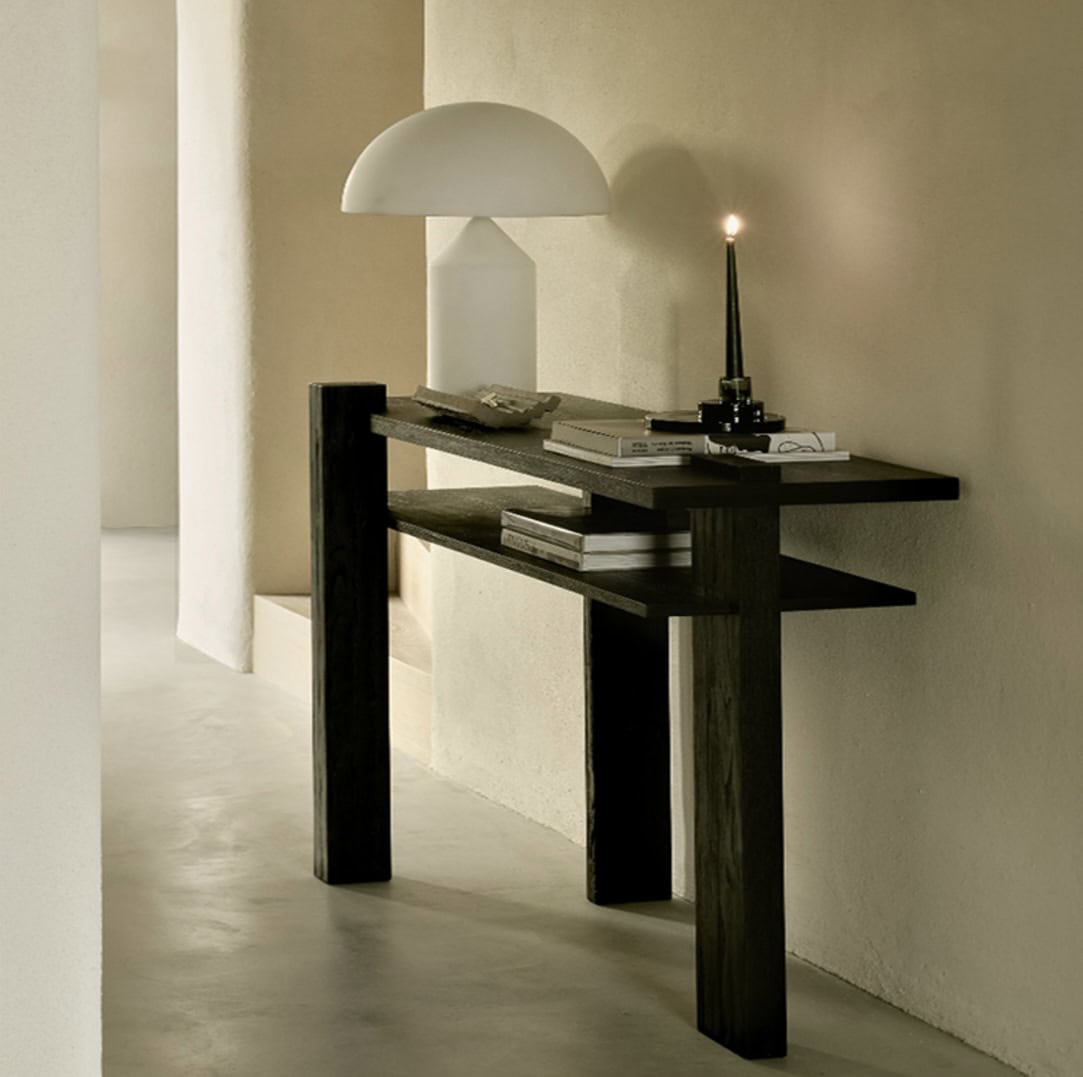 Styling a modern black console table with sculptural accessories
