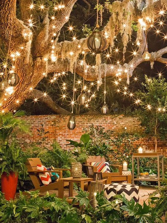 String lights and some festive decor make this backyard into a retreat Easy ways to update outdoor spaces for spring MyFixitUpLife MyFixitUpLife String lights and some festive decor make this backyard into a retreat