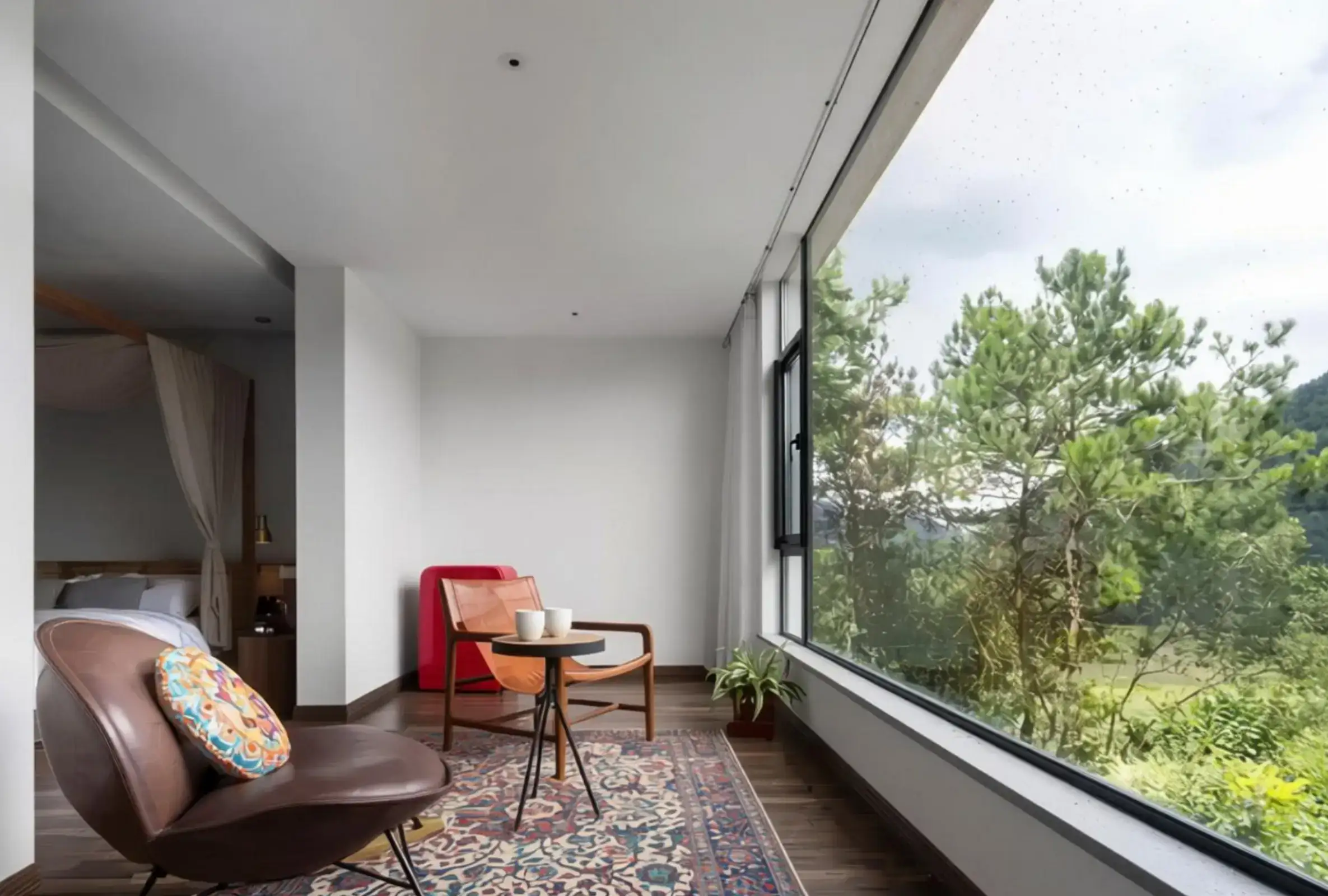 Sunlit balcony living space framed by Seamless thermally broken (broken-bridge) aluminium flat windows