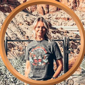 Mickey Mouse Disneyland t-shirt in front of red rock canyon landscape.