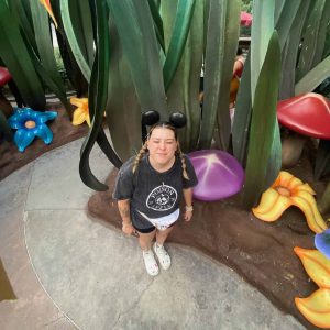 Colorful indoor flower and garden themed decor at 407 and Beyond Vacation Co.