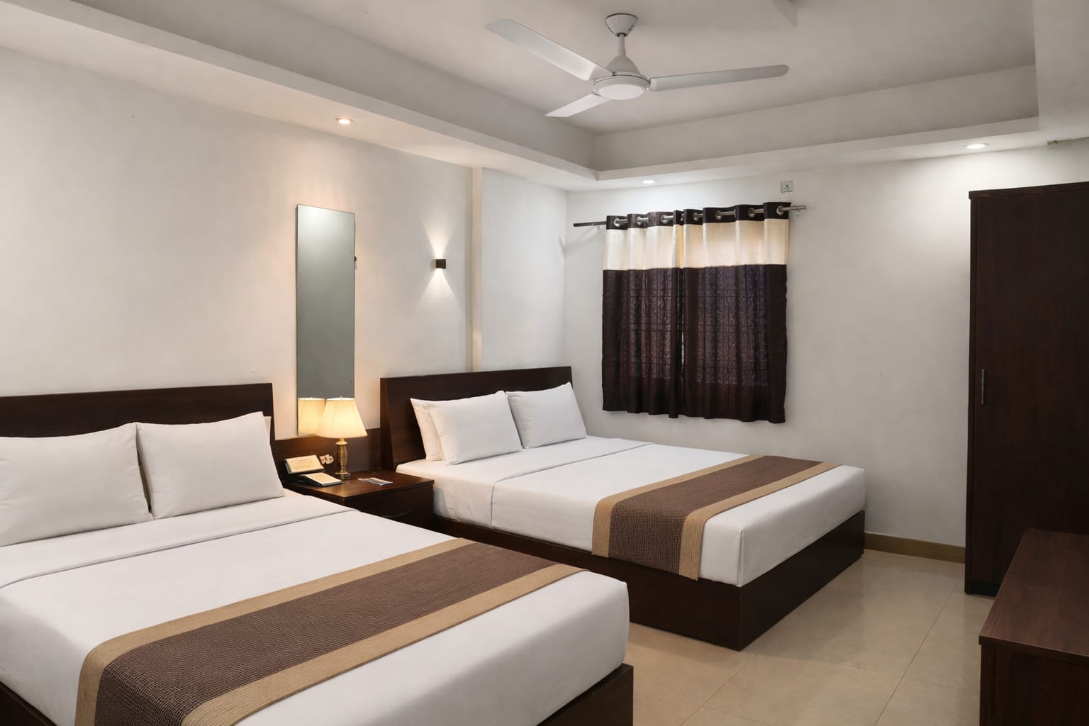 Aarav Hotels Indore spacious room with elegant decor and modern amenities