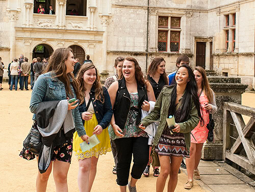 Girls walking through château d'azay-le-rideau in France