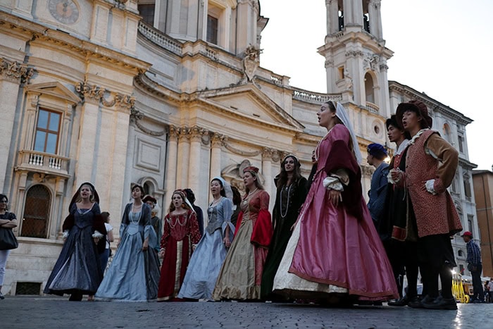 Participants performing in a choir in Italy