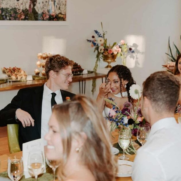 Richmond documentary wedding photographer capturing joyful moments at a wedding reception.