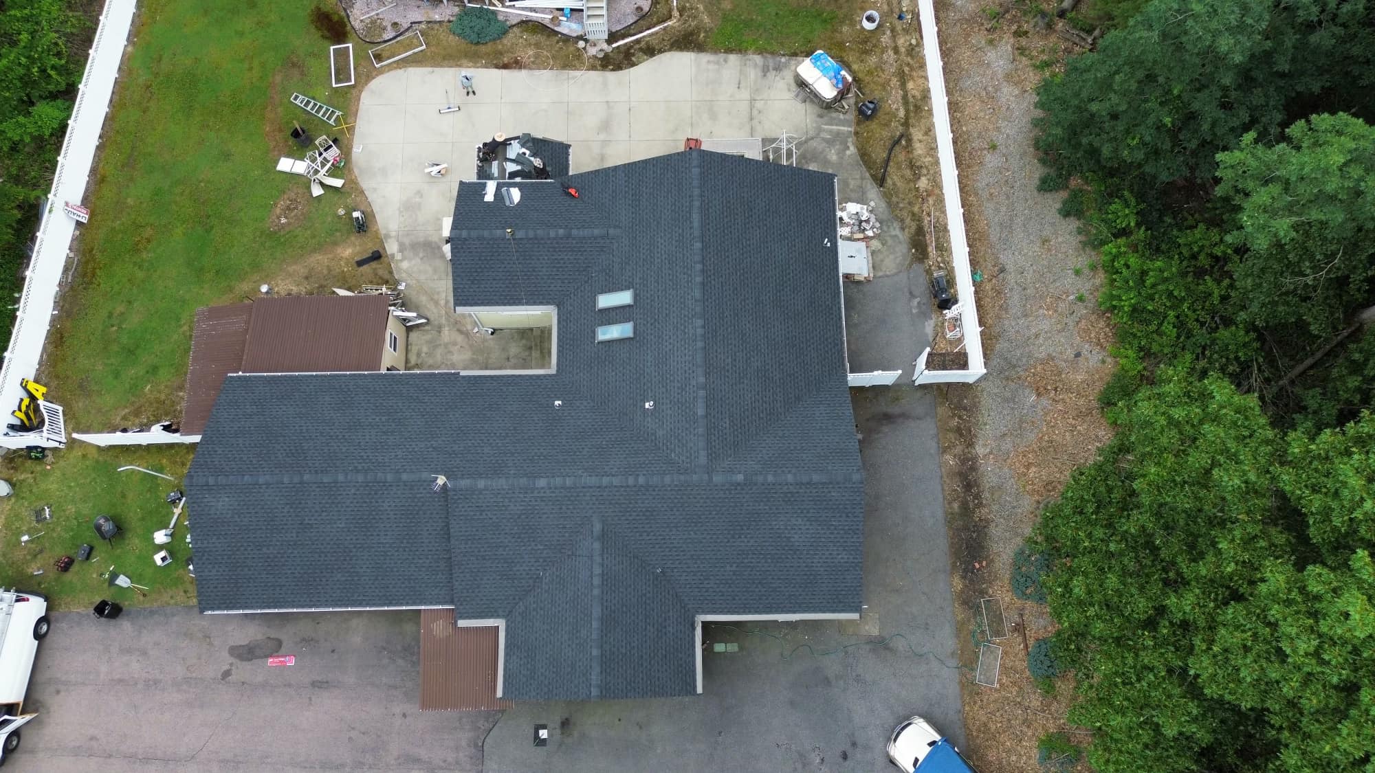 Aerial drone view of completed AMP Roofing replacement project in Easton