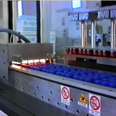 Impianto di tampografia per tappi in plastica
