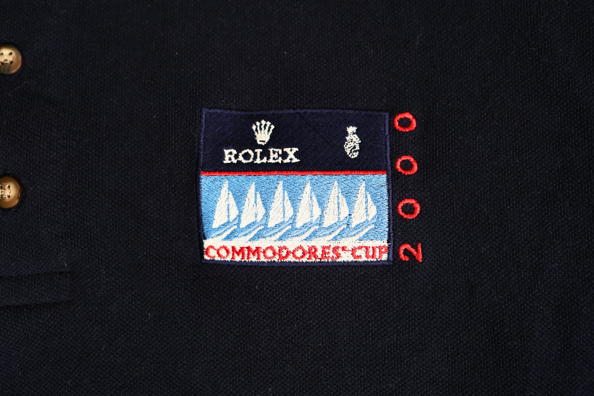 HB31-021 – Vintage 2000 Rolex Commodores’ Cup Polo Shirt Navy Blue Large – Baer & Bosch Auctions