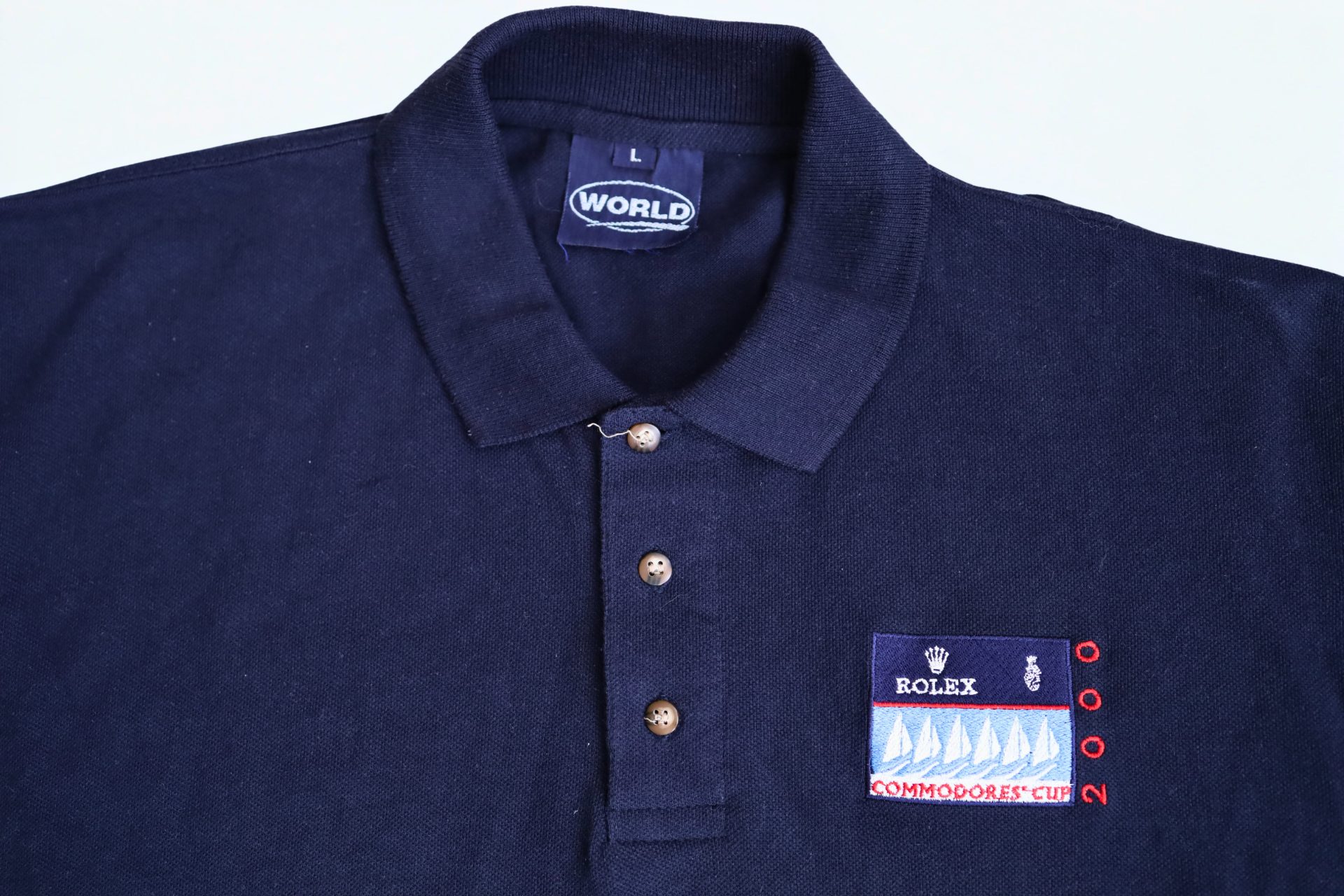 HB31-021 – Vintage 2000 Rolex Commodores’ Cup Polo Shirt Navy Blue Large – Baer & Bosch Auctions