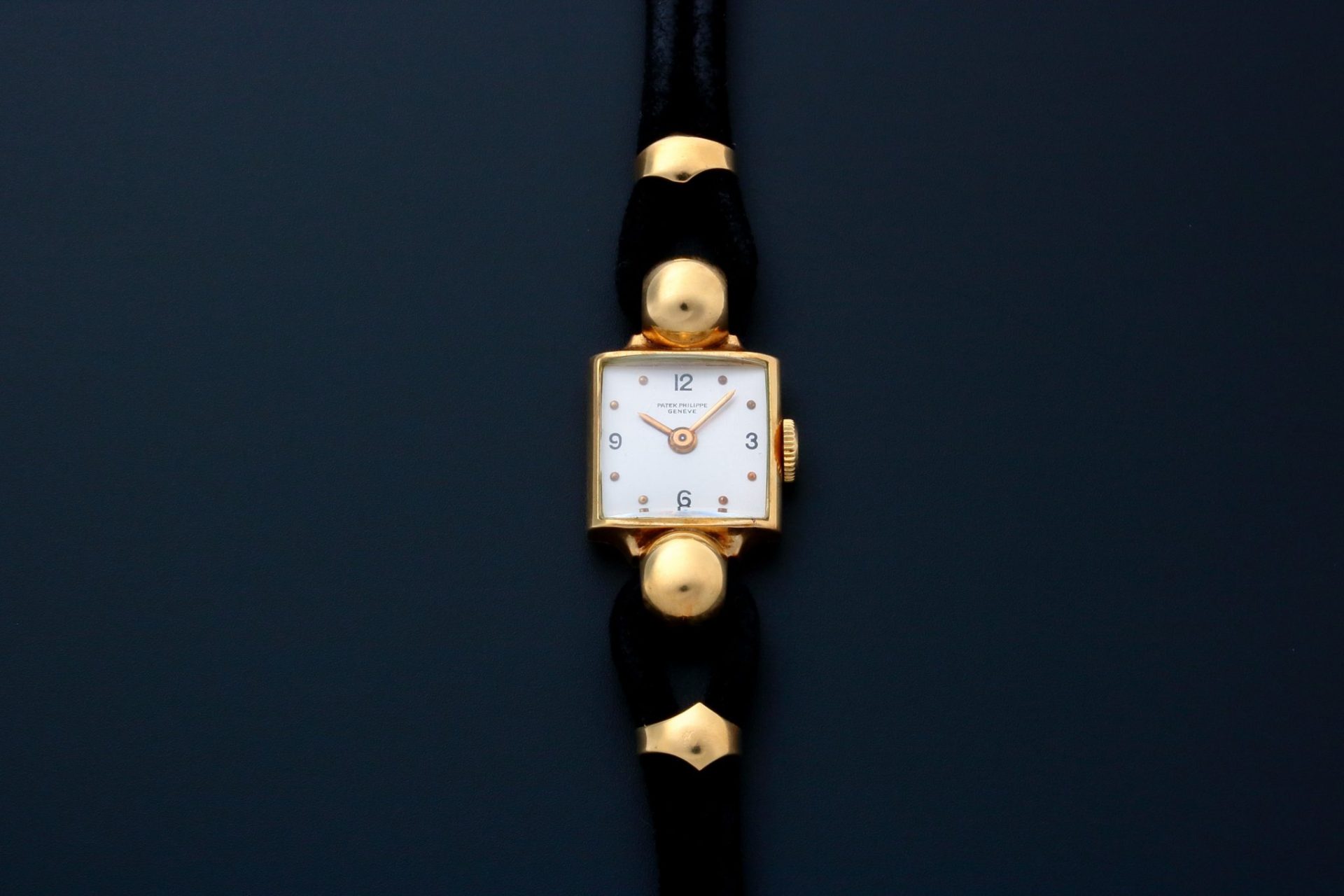 Patek-Philippe-Geneve-18k-Yellow-Gold-Watch.jpg