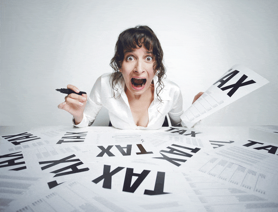 Crazy woman with tax sheets