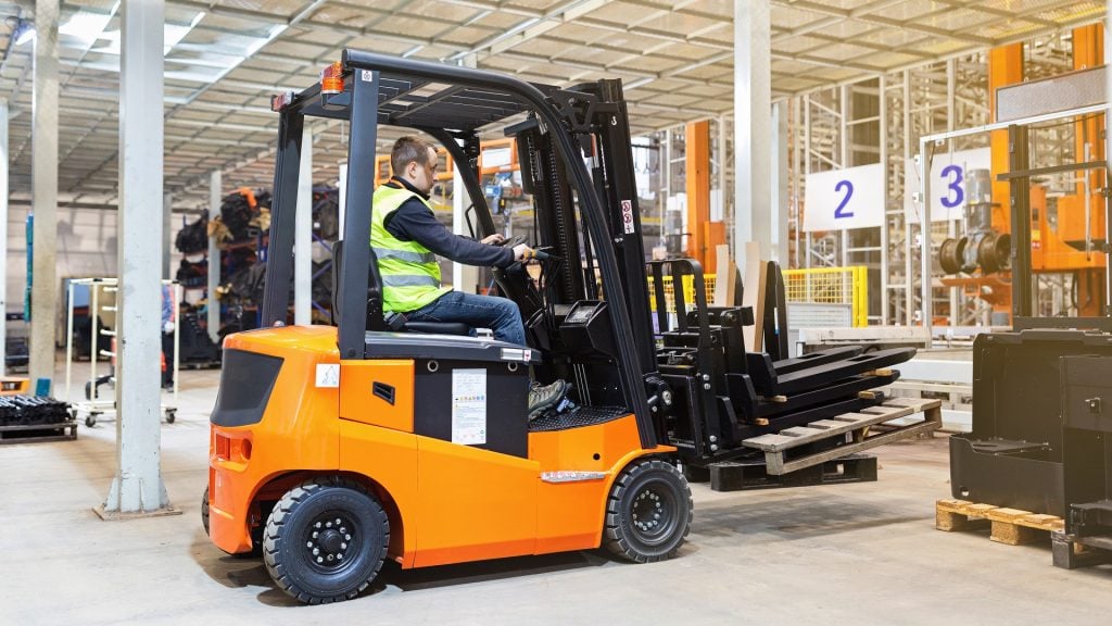 Forklift in use in a warehouse