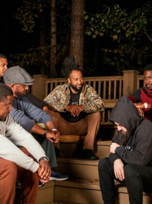 A powerful image portraying the authentic brotherhood and emotional intelligence of Black men, symbolizing the themes of the Kings of the Queen City reality show.