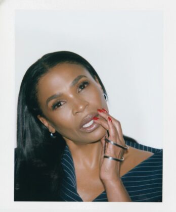 A confident portrait of actress Nia Long looking directly at the camera, exuding absolute authority and grace.
