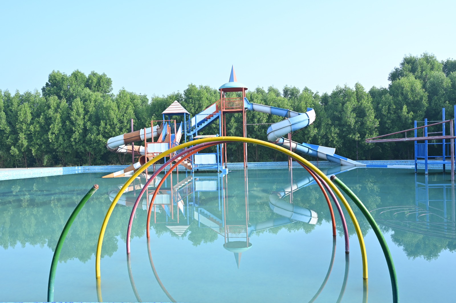 Swimming pool with water slides at Camp Unity