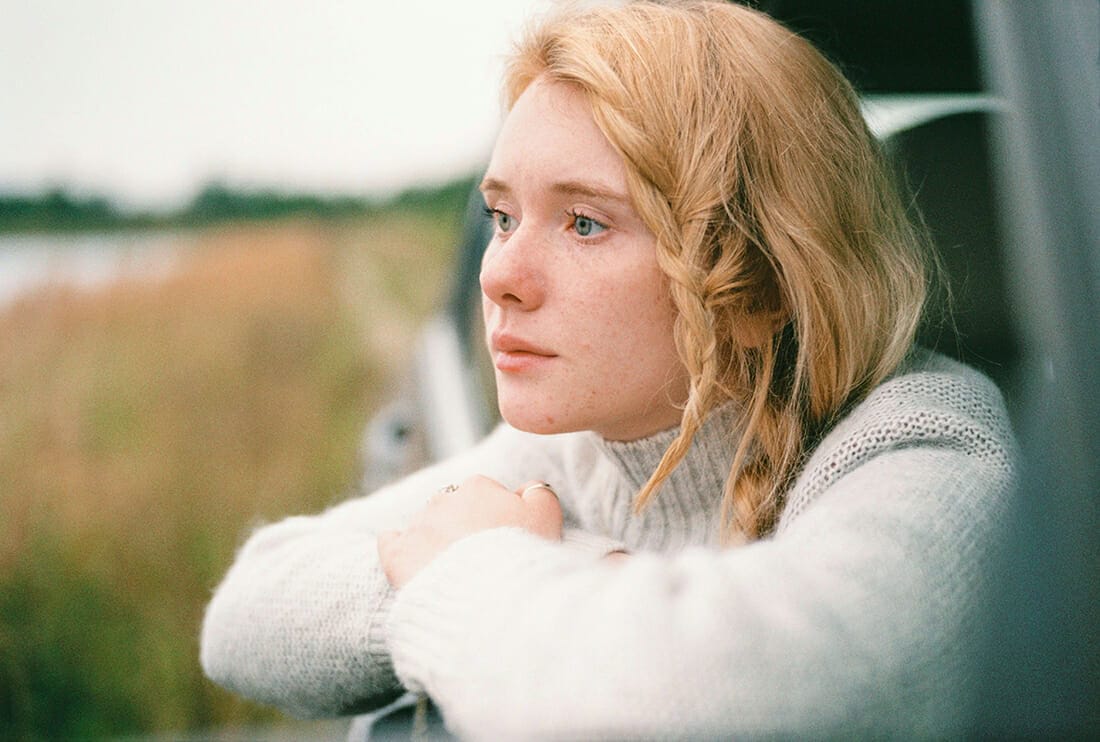 woman with freckles and blonde hair
