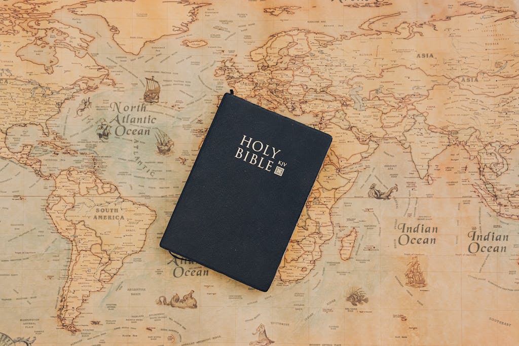 Bible resting on a world map representing world missions