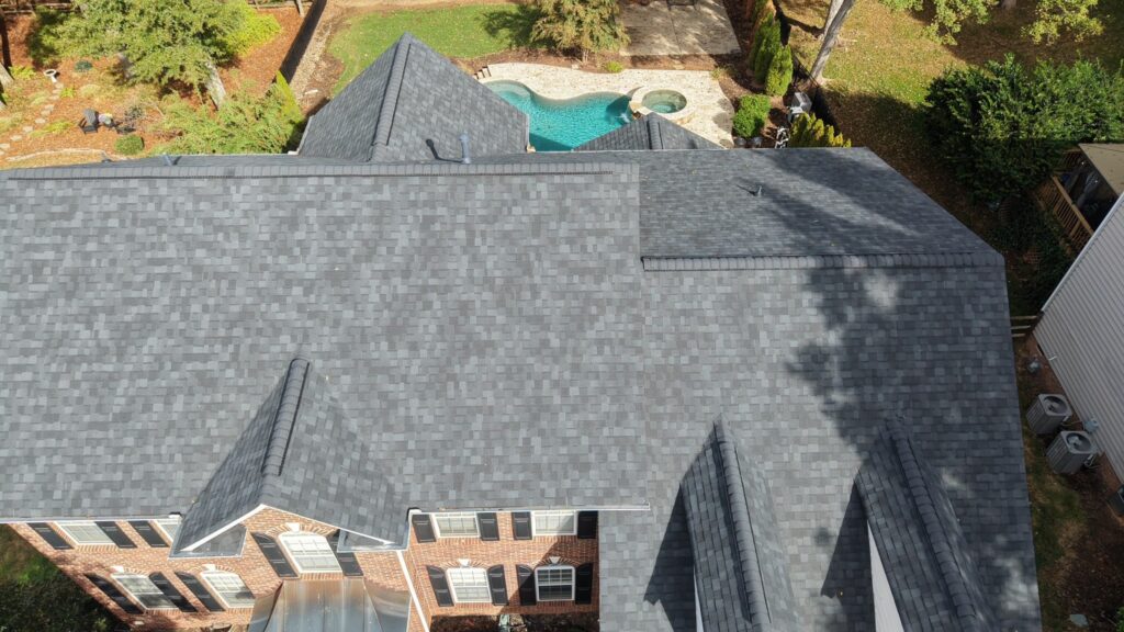New Onyx Black roof above the backyard pool, Waxhaw NC