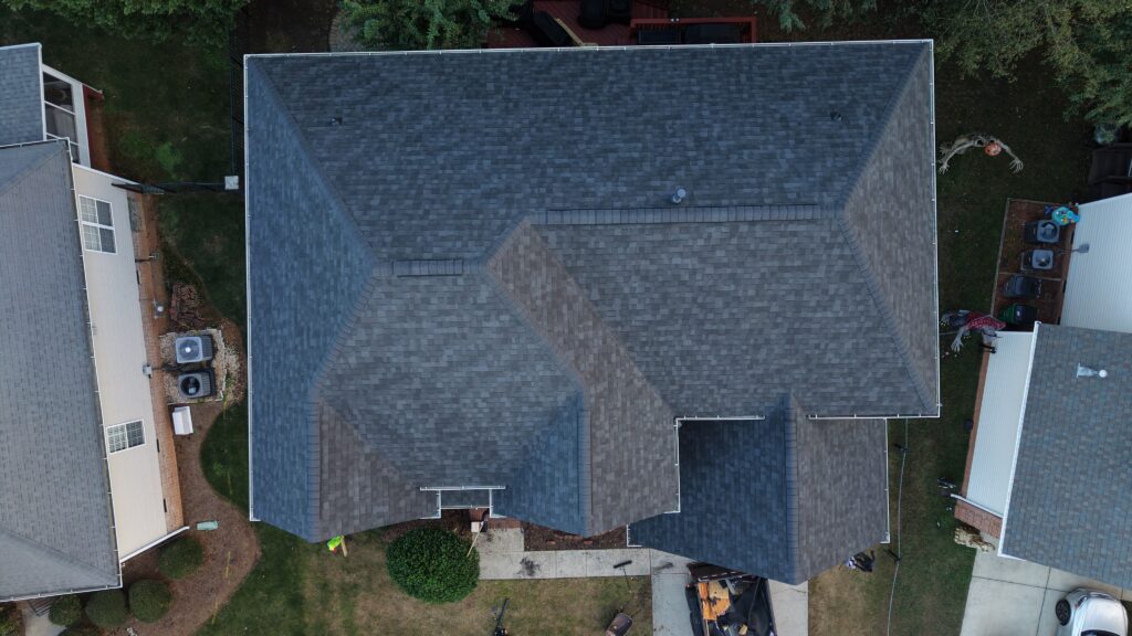 Overhead drone view of a finished Owens Corning Duration Onyx Black roof replacement in Charlotte NC